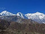 09 Tilicho Peak amd Nilgiri North From Trail To Mesokanto La Tilicho Peak and the wide Nilgiri North ridge was directly across the valley in the early morning from the trail towards the Mesokanto La and Tilicho Lake.